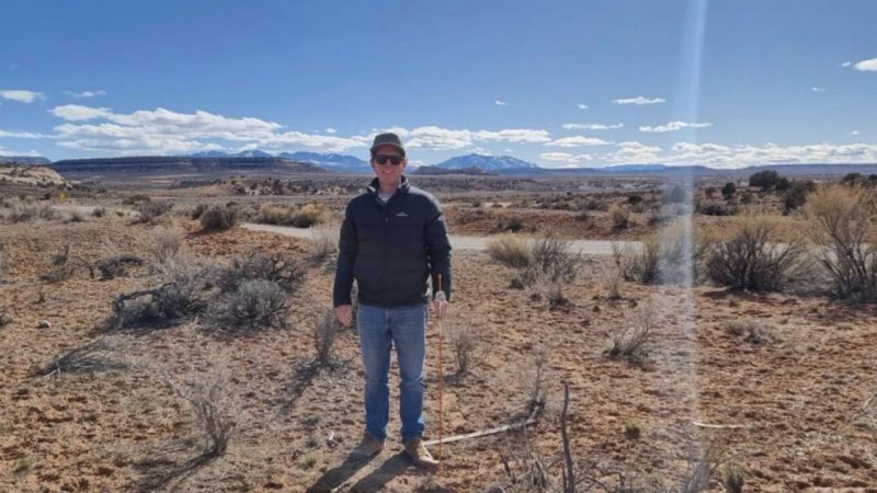 Mandrake Resources (ASX:MAN) -Managing Director James Allchurch next to a claim stake at the Utah Lithium Project