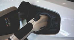 An electric car charger at work powering up an EV vehicle