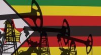 Pump- jacks on background in colors of national flag. Oil and gas wells production concept. Zimbabwe