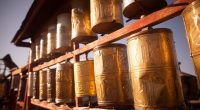 Spinning Buddhist prayer drums at a monastery in Mongolia.