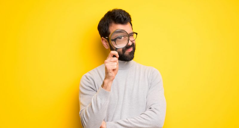 Man with magnifying glass