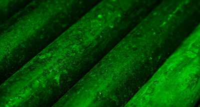 Image of steel in green light.