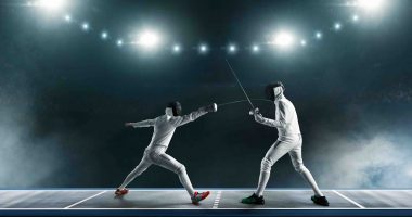 Two men fencing