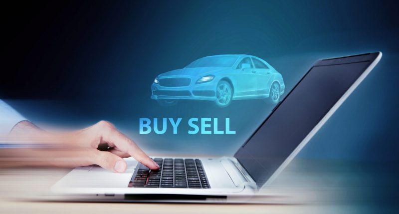 Picture showing person buying a car over the internet