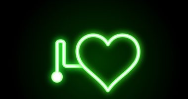 Image of a neon sign with a heart