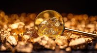 Gold nuggets under a magnifying glass