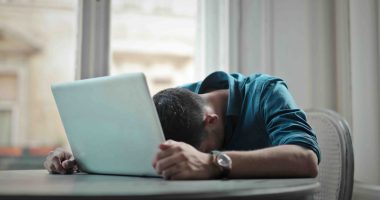 Man in despair at laptop