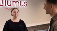 Lumus Imaging staff member greeting patient