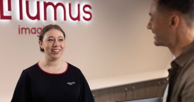 Lumus Imaging staff member greeting patient