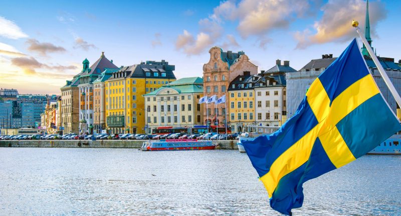 Image of a Swedish flag waving in Stockholm