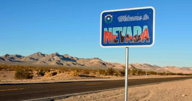 Nevada state border road sign