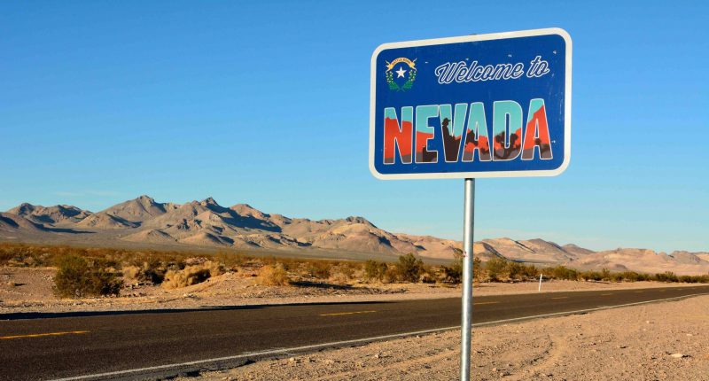 Nevada state border road sign