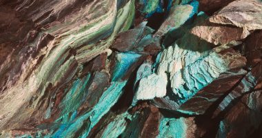 Abstract image of copper on the walls of a mine