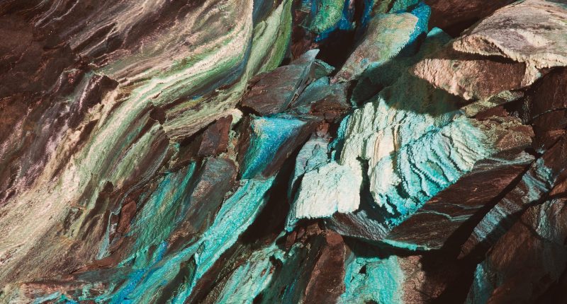 Abstract image of copper on the walls of a mine