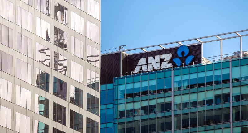 The ANZ logo on a huge sign atop an Adelaide building.