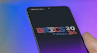 BRICS 2024 logo on phone screen