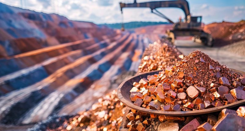 Image of a truck and other implements at a copper mine