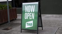 Green TAB sign