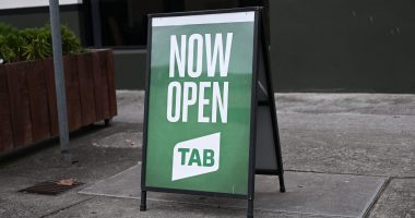 Green TAB sign