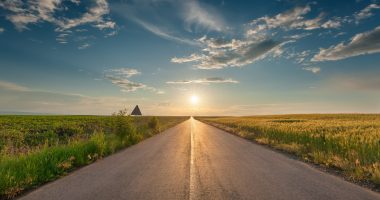 A road with a ray of sunlight