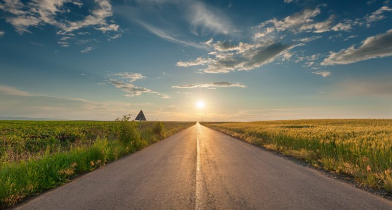 A road with a ray of sunlight