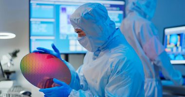 A Weebit Nano tech worker tests a ReRAM chip sheet.