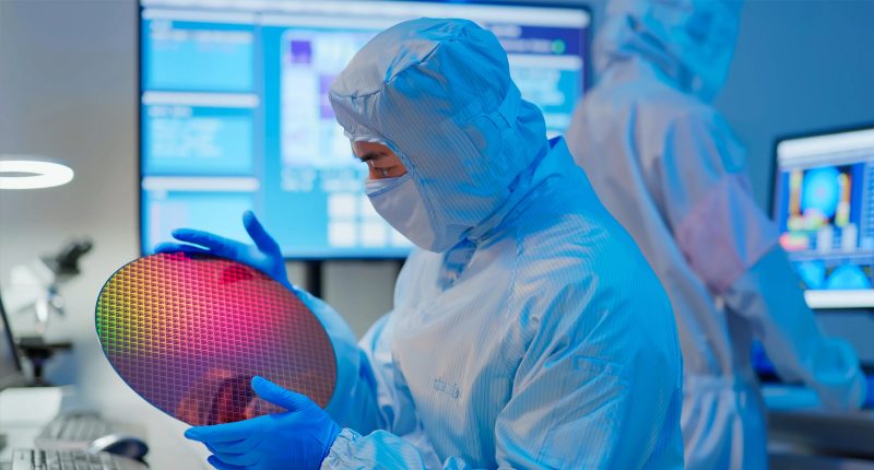 A Weebit Nano tech worker tests a ReRAM chip sheet.