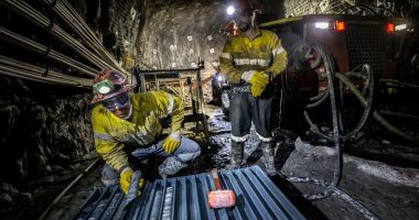 Two miners in a Westgold Resources dig site.