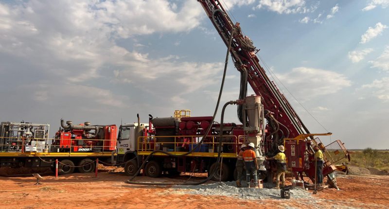 A crane and other digging equipment owned by WIN Metals at the Butcher's Creek dig site.