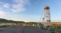 A tower rig over a flattened mining dirt road owned by West Coast Silver.