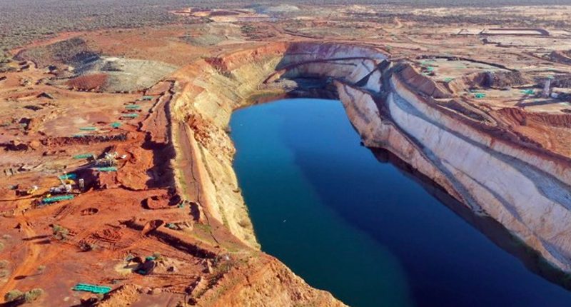 A deep blue river next to the gold deposits from the Youanmi gold project.