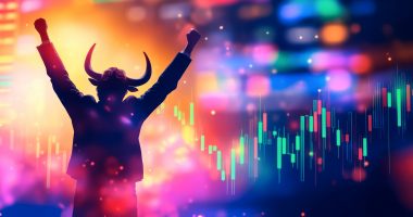 Trader with bull head celebrating a successful trade, throwing up hands. Background is candlestick pattern chart