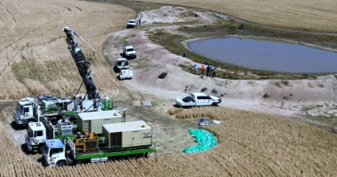 Trucks and workers at the Gilmore project owned by Linq Minerals