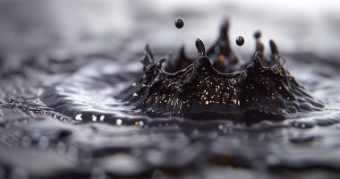 Crown Water Splash in crude oil Black Liquid Close-up