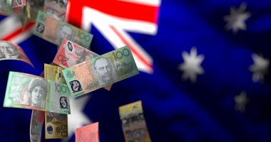 Falling Australian Currency Notes Against the Australian Flag, Representing Economic Volatility and the Potential for Financial Instability in the Australian Market..