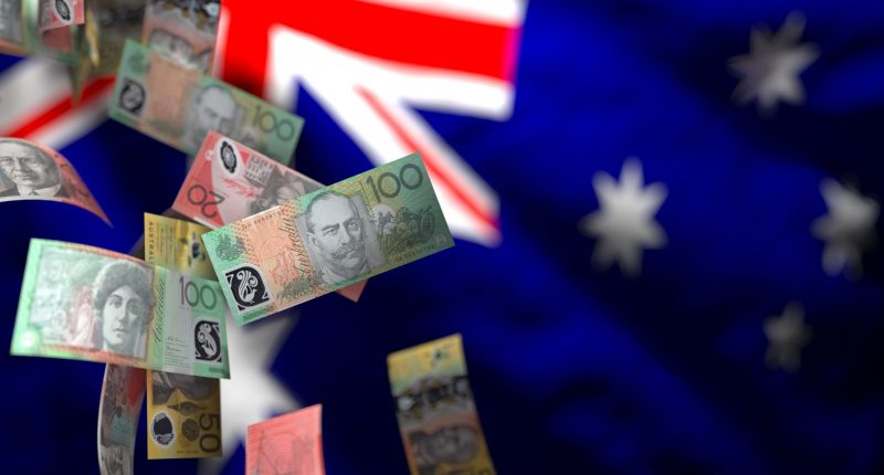 Falling Australian Currency Notes Against the Australian Flag, Representing Economic Volatility and the Potential for Financial Instability in the Australian Market..