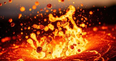 Close-up view of erupting molten lava, showcasing the intense heat and dynamic nature of volcanic activity.